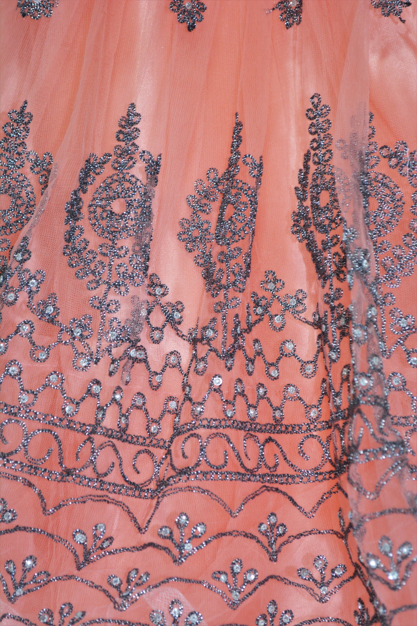 Orange dress with thread work